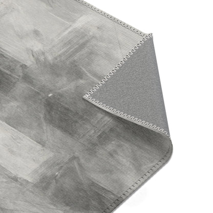 Abstract gray watercolor area rug by Printify, modern neutral design suitable for living room accents.