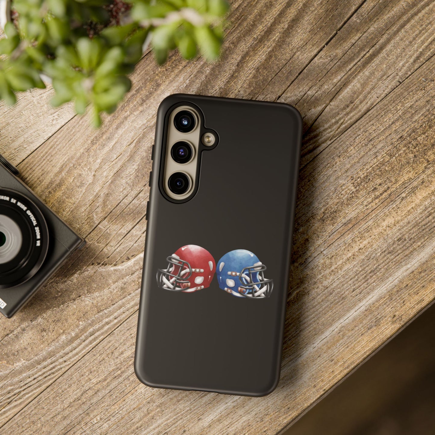 Red and blue football helmet tough phone case for iPhone, protective Printify cover with detailed helmet design.