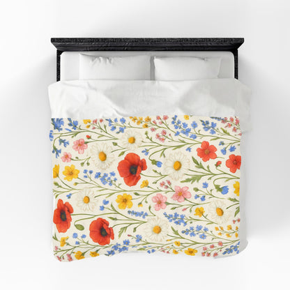 Velveteen plush blanket with all-over poppy daisy floral print featuring wildflower meadow design, by Printify.