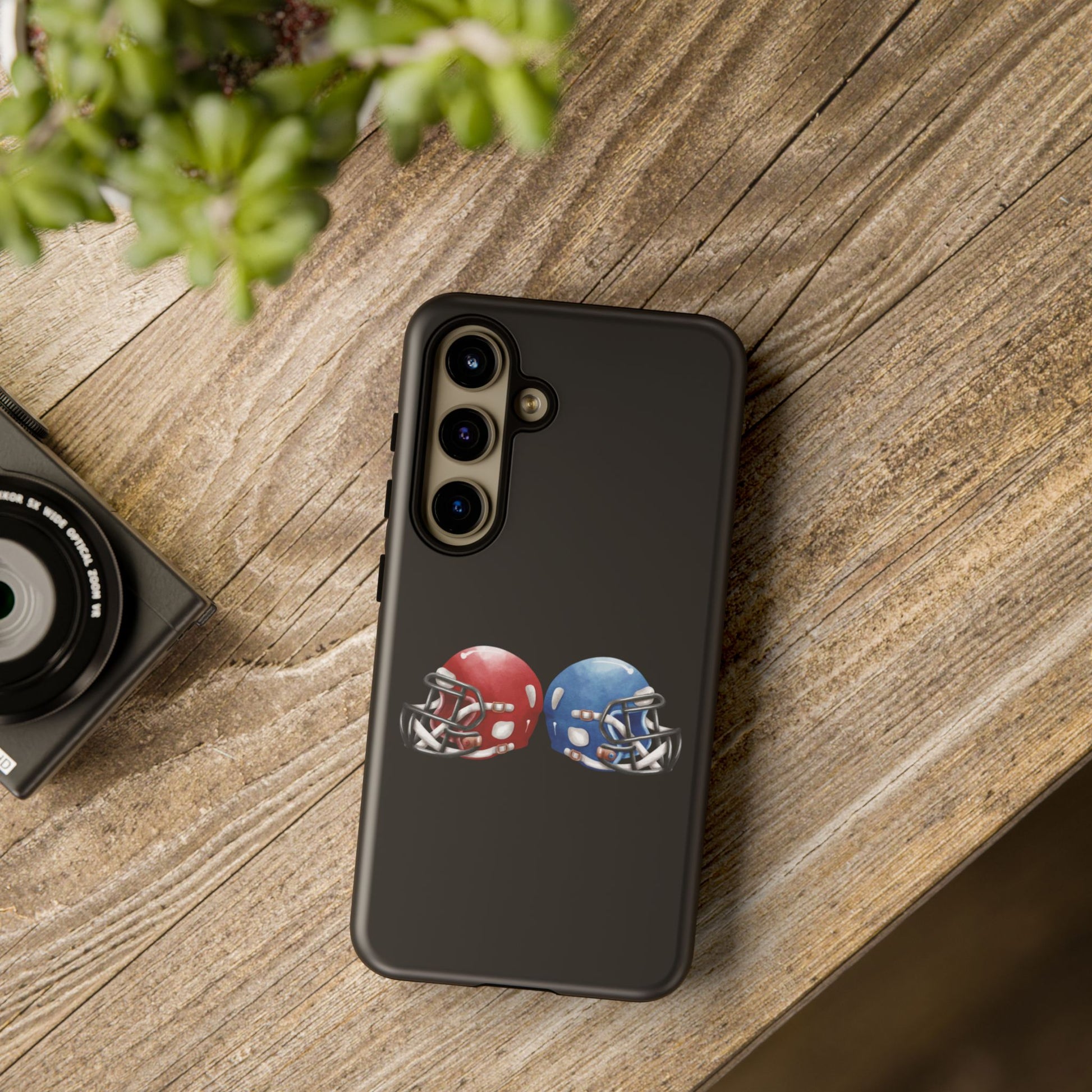 Red and blue football helmet tough phone case for iPhone, protective Printify cover with detailed sports helmet design.