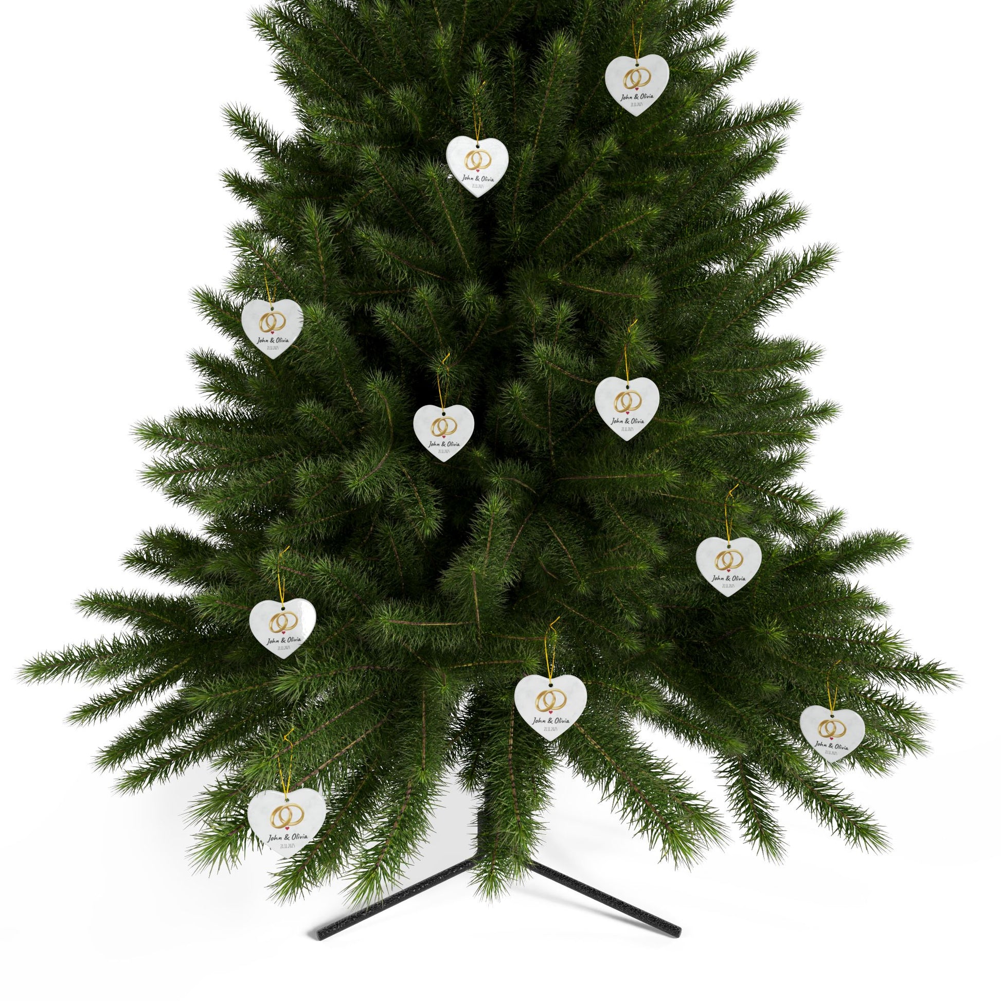 Round ceramic wedding rings ornament with personalized names and date, decorative keepsake for special occasions.