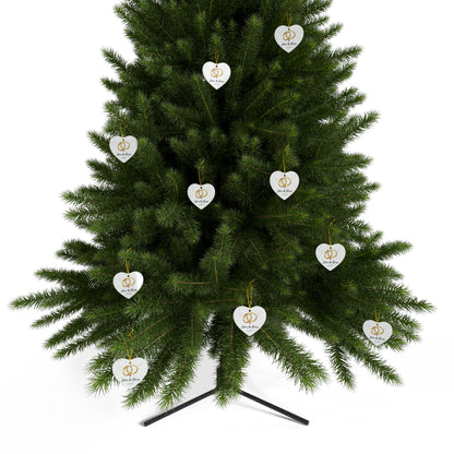 Round ceramic wedding rings ornament with personalized names and date, decorative keepsake for special occasions.
