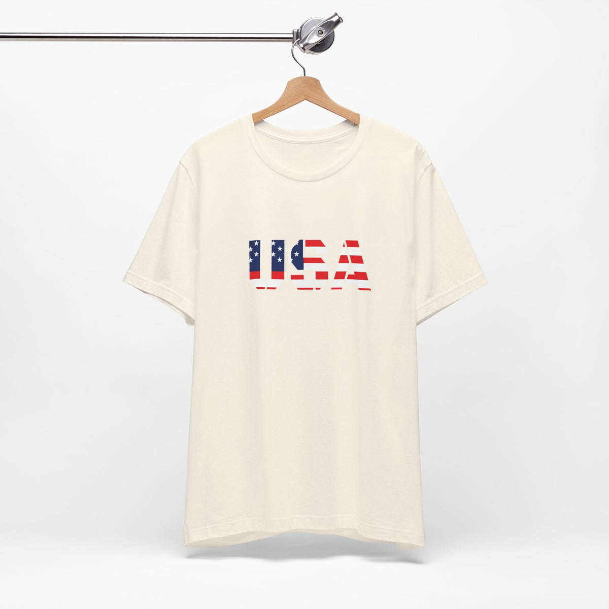 USA Flag Text T-shirt by Printify featuring patriotic red, white, and blue design for Fourth of July celebrations.