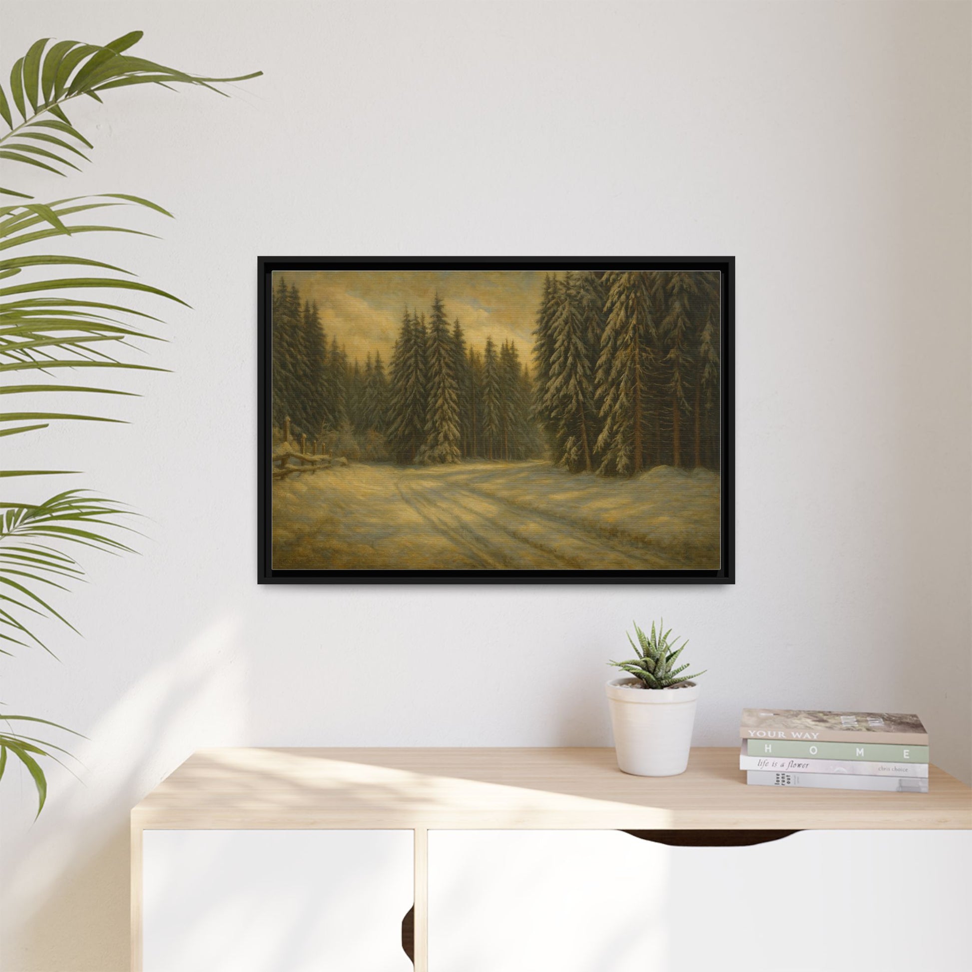Framed matte canvas print of a winter forest landscape wall art by Printify, showcasing snow-covered trees and a serene woodland scene.