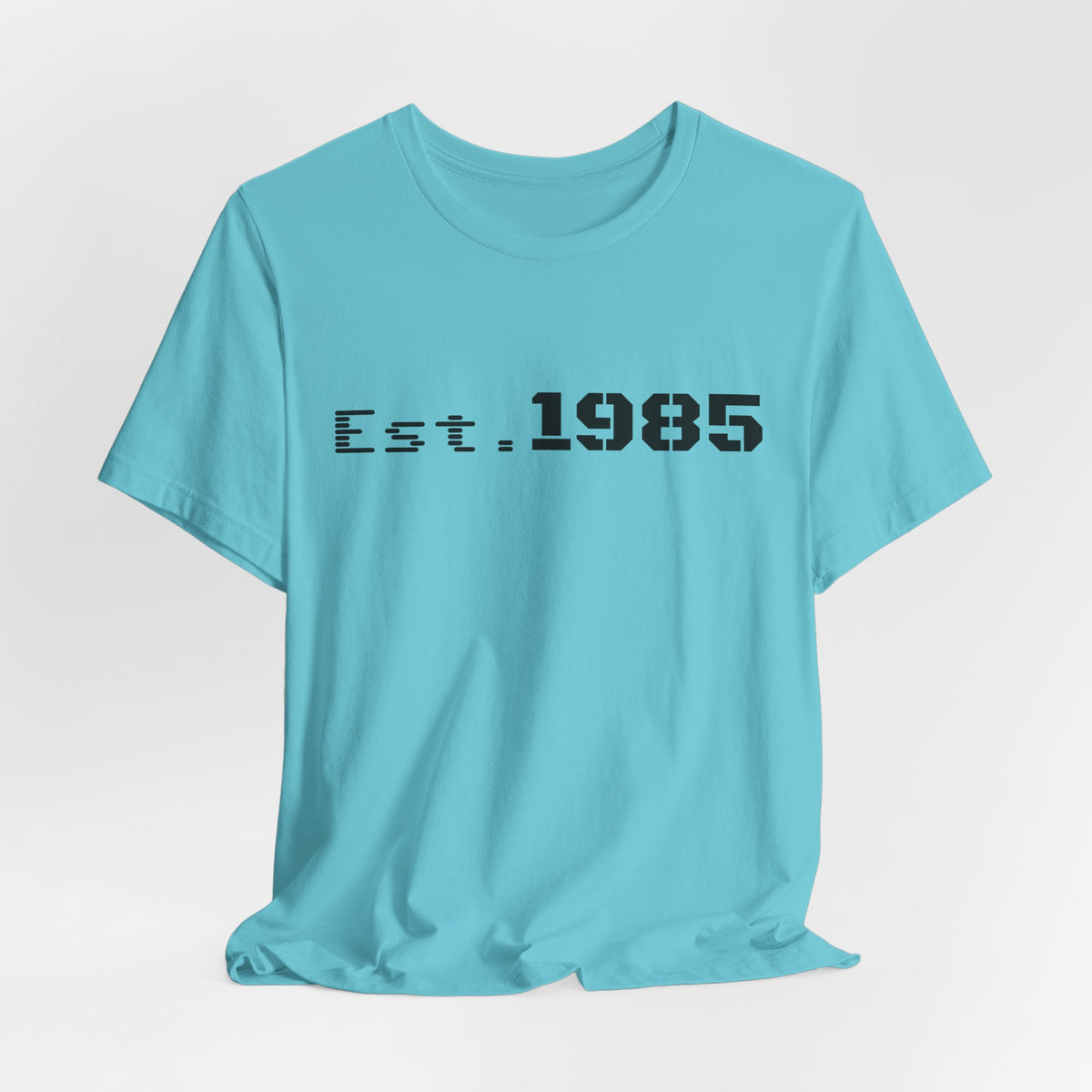 Vintage Est. 1985 graphic T-shirt by Printify featuring a retro style design and classic year logo on soft fabric.