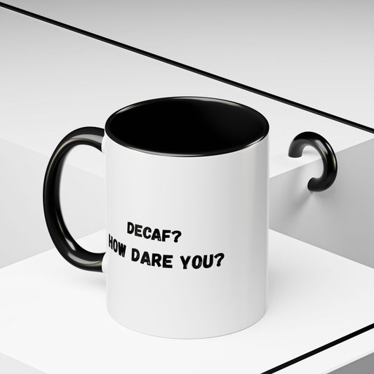Ceramic coffee mug with "Decaf? How Dare You?" slogan, 11oz or 15oz, printed by Printify, shown from a front view.