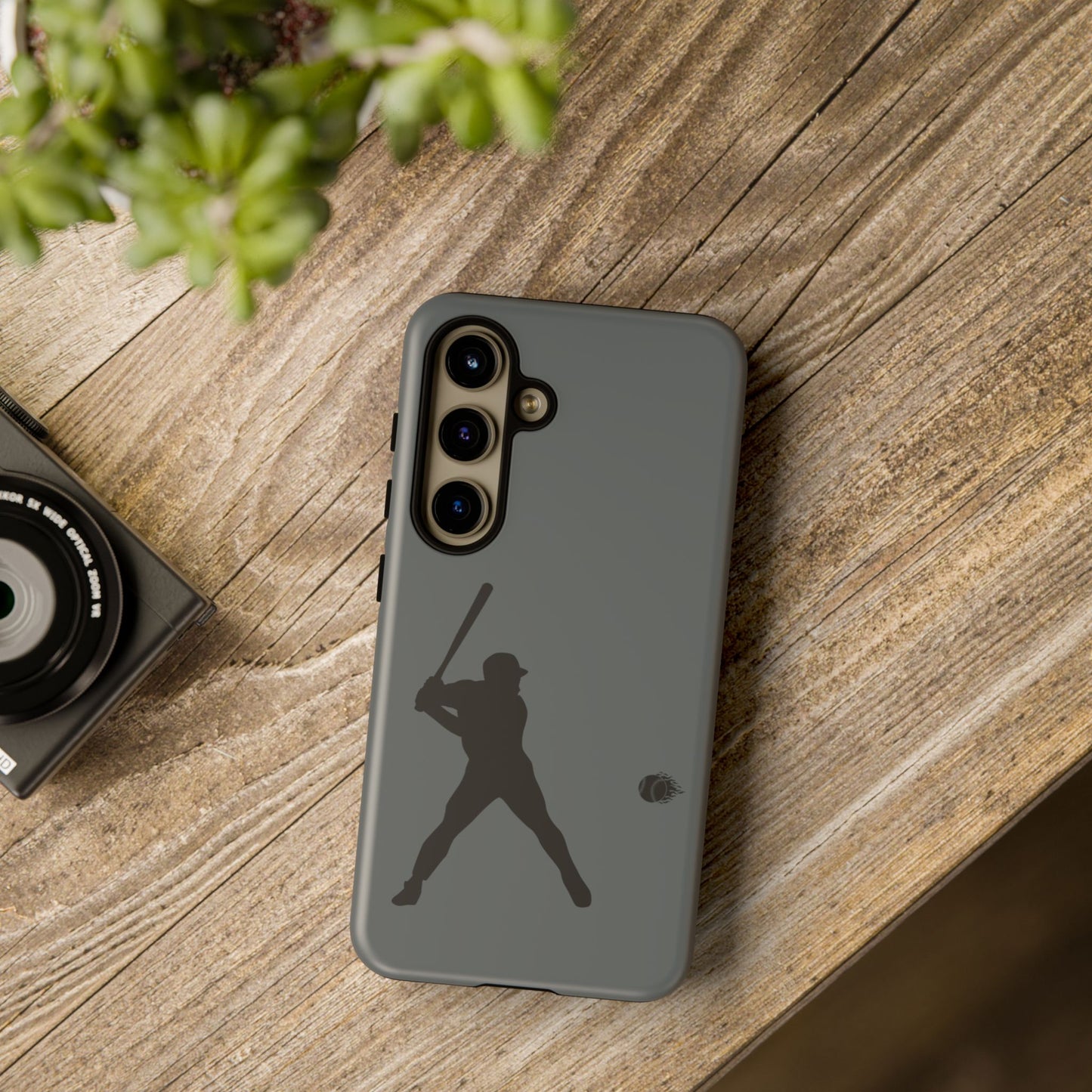 Black Printify baseball silhouette tough phone case with sporty design, compatible with iPhone, provides durable protection.