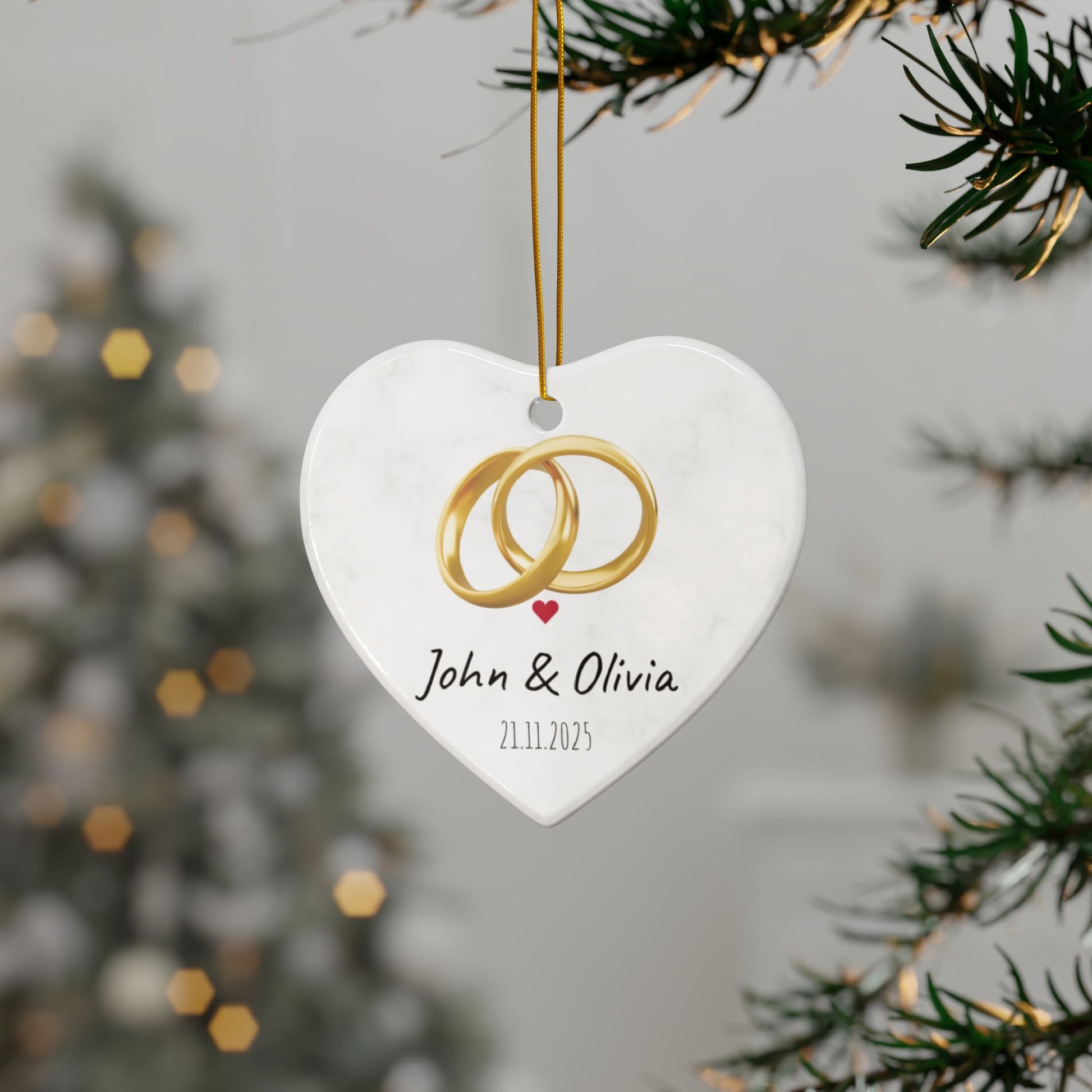 Round ceramic wedding rings ornament by Printify featuring personalized names and date, ideal for wedding keepsakes.