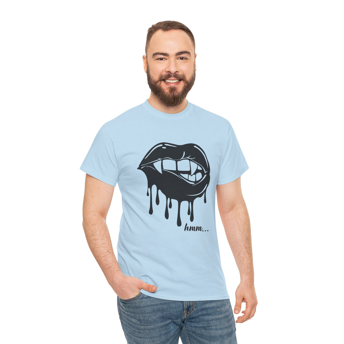 Graphic T-shirt featuring dripping lips with "hmm..." bite design, by Printify, showing a bold, artistic graphic on the front.