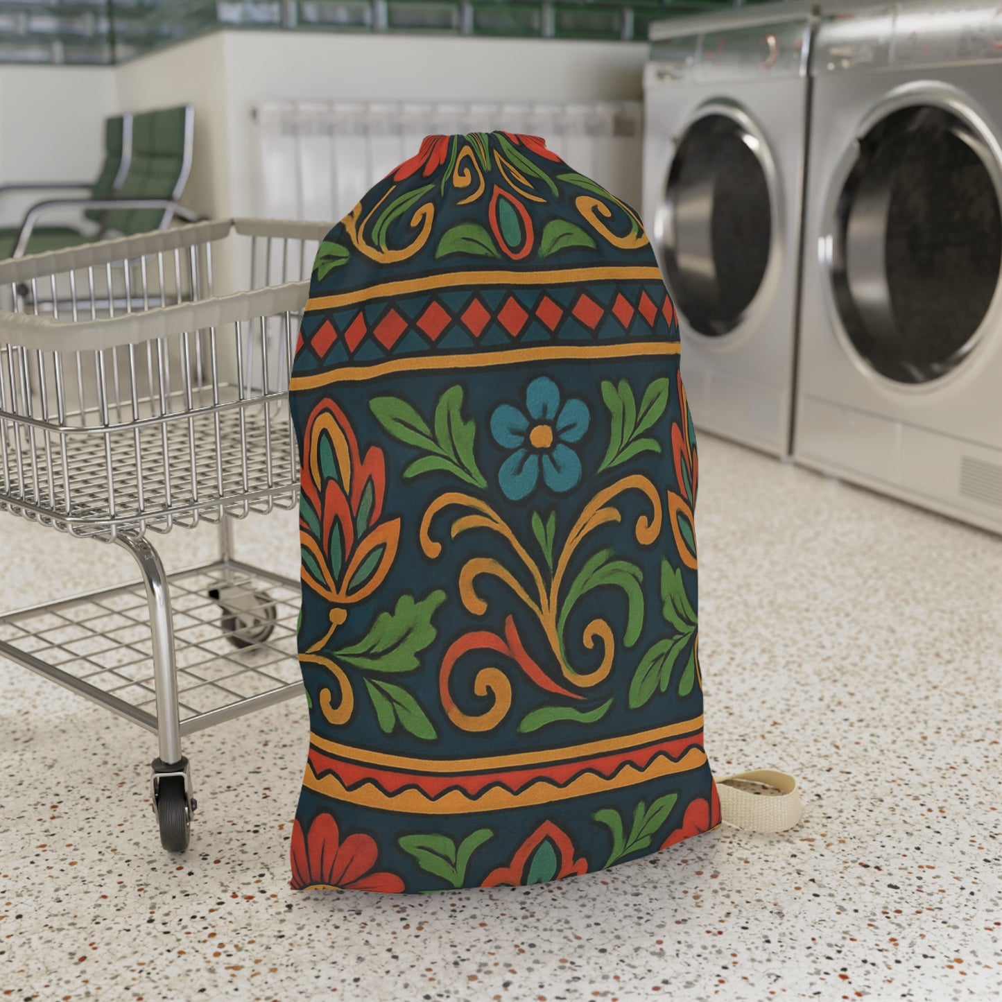 Boho floral print laundry bag with drawstring closure, featuring folk floral pattern in vibrant colors, ideal for laundry organization.