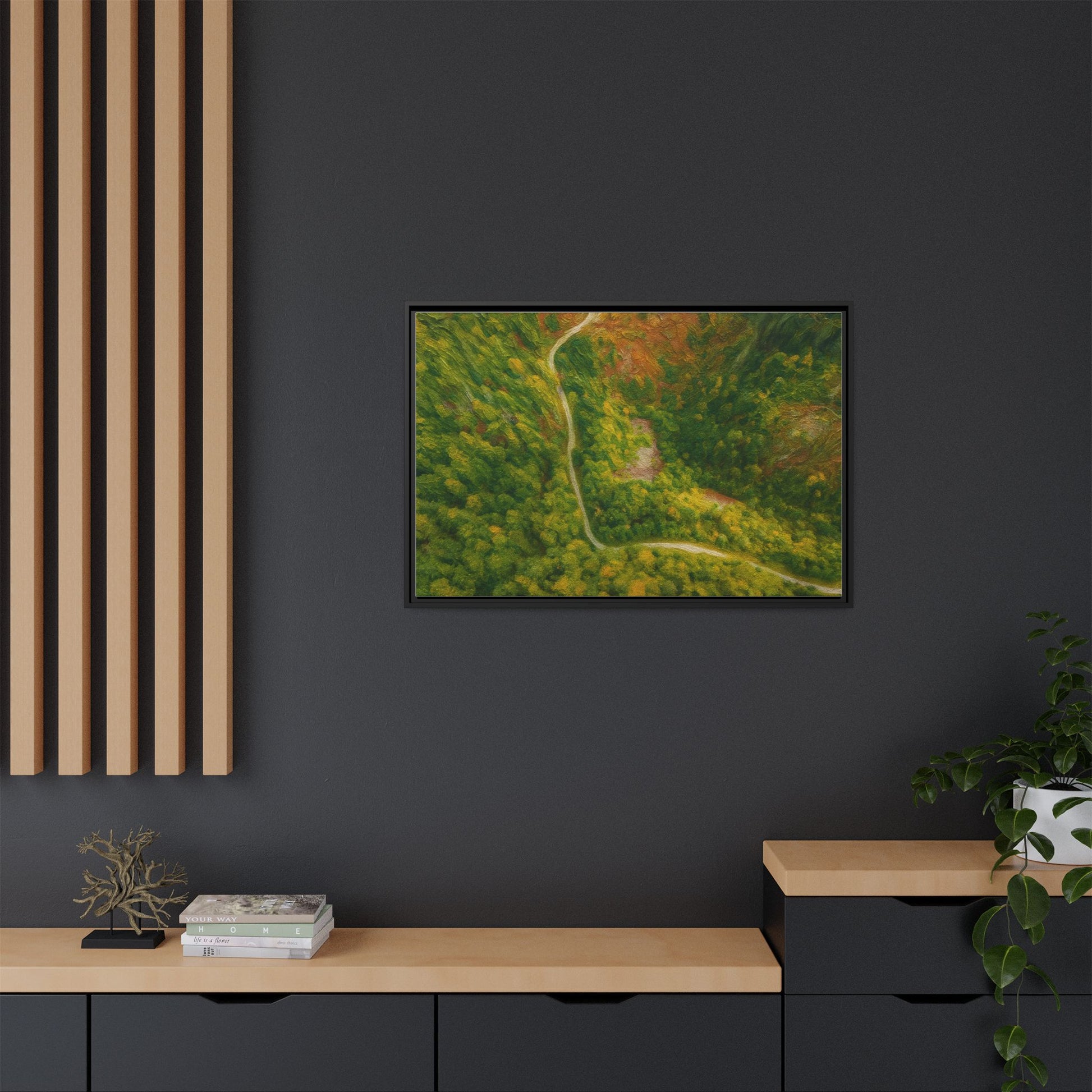 Colorful framed matte canvas wall art featuring an aerial view of a forest path landscape by Printify.