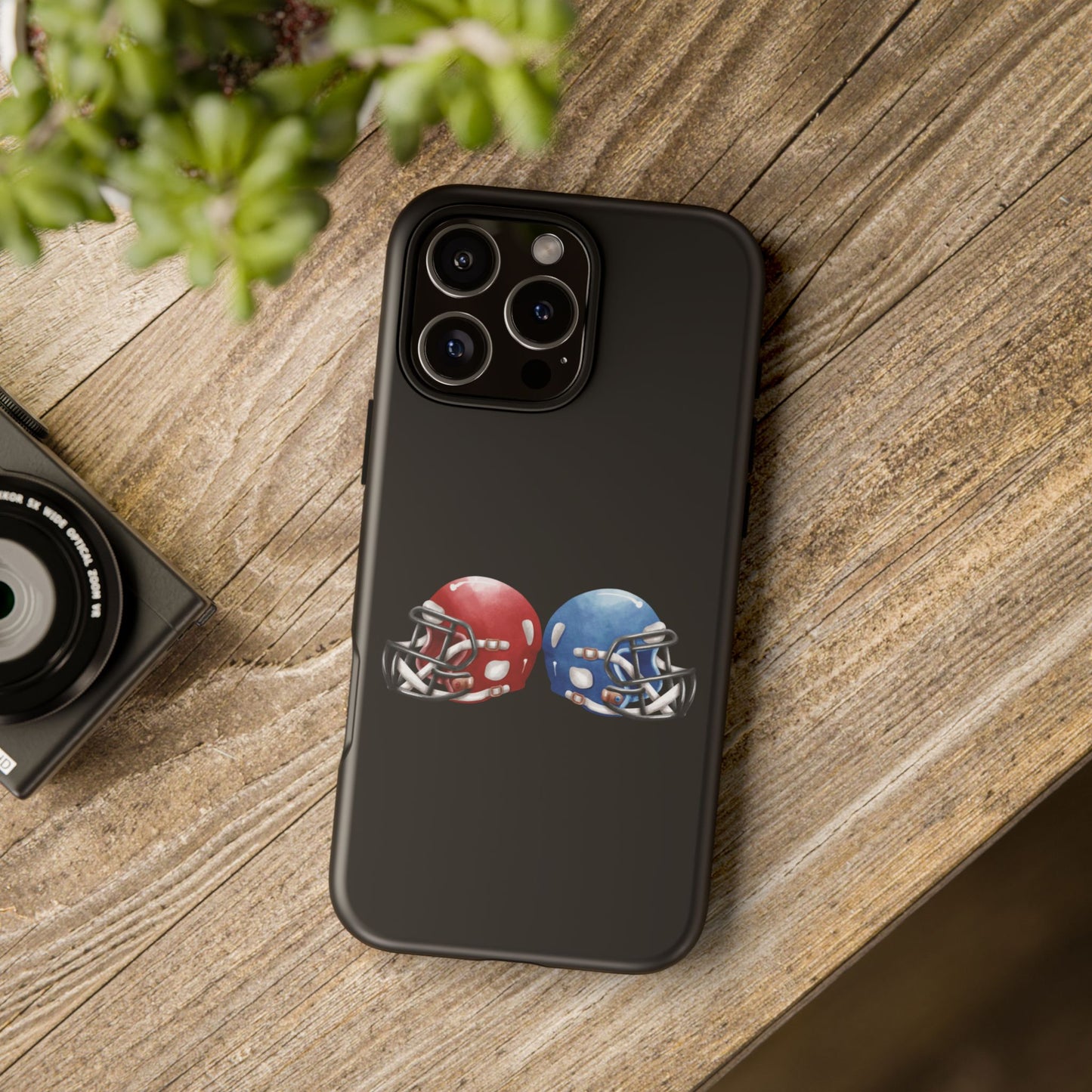 Red and blue football helmet phone case for iPhone, durable protective cover with printed football helmet design.