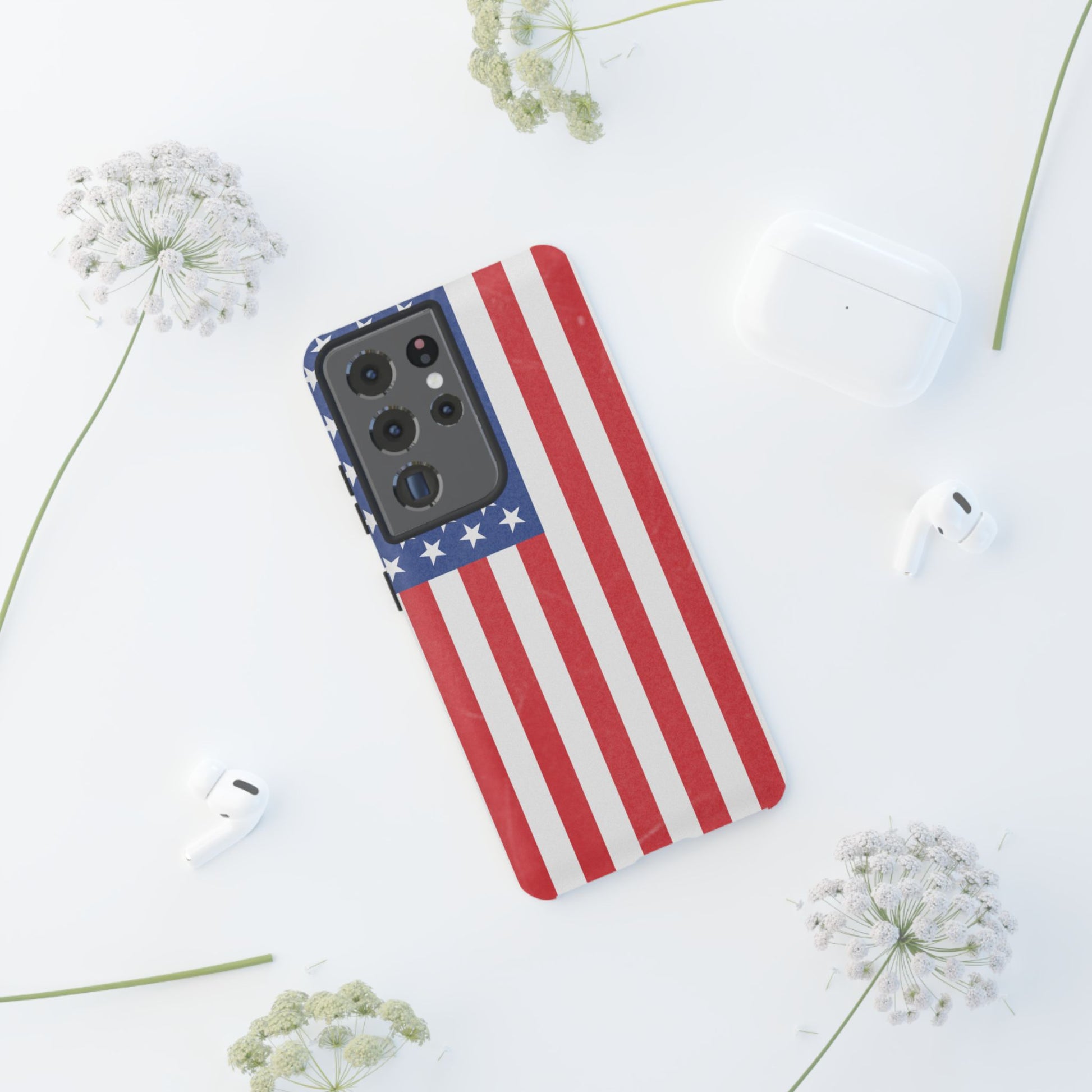 American flag tough phone case for iPhone and Samsung, patriotic protective cover with bold flag design by Printify.