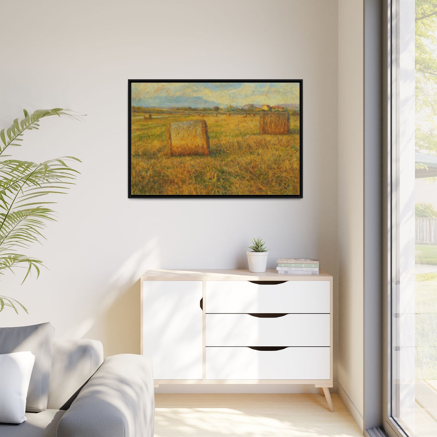 Framed matte canvas wall art featuring a rustic hayfield landscape print by Printify.
