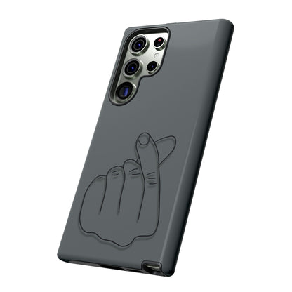 Silicone phone case with embossed Korean finger heart design, compatible with smartphones, by Printify.