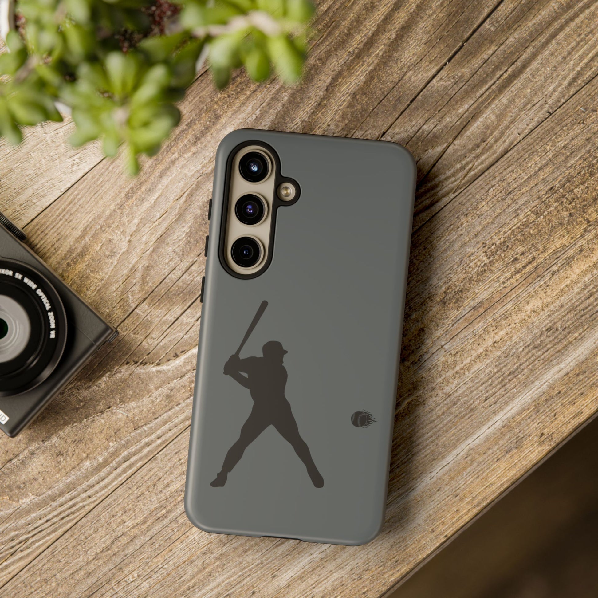 Black baseball silhouette tough phone case for iPhone, protective sporty design by Printify, with a rugged, durable exterior.