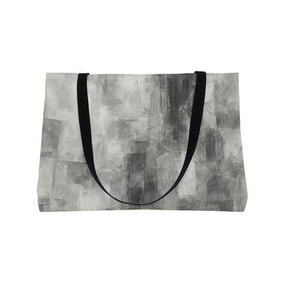 Gray abstract print weekender tote bag for women, stylish travel bag with spacious interior and sturdy handles.