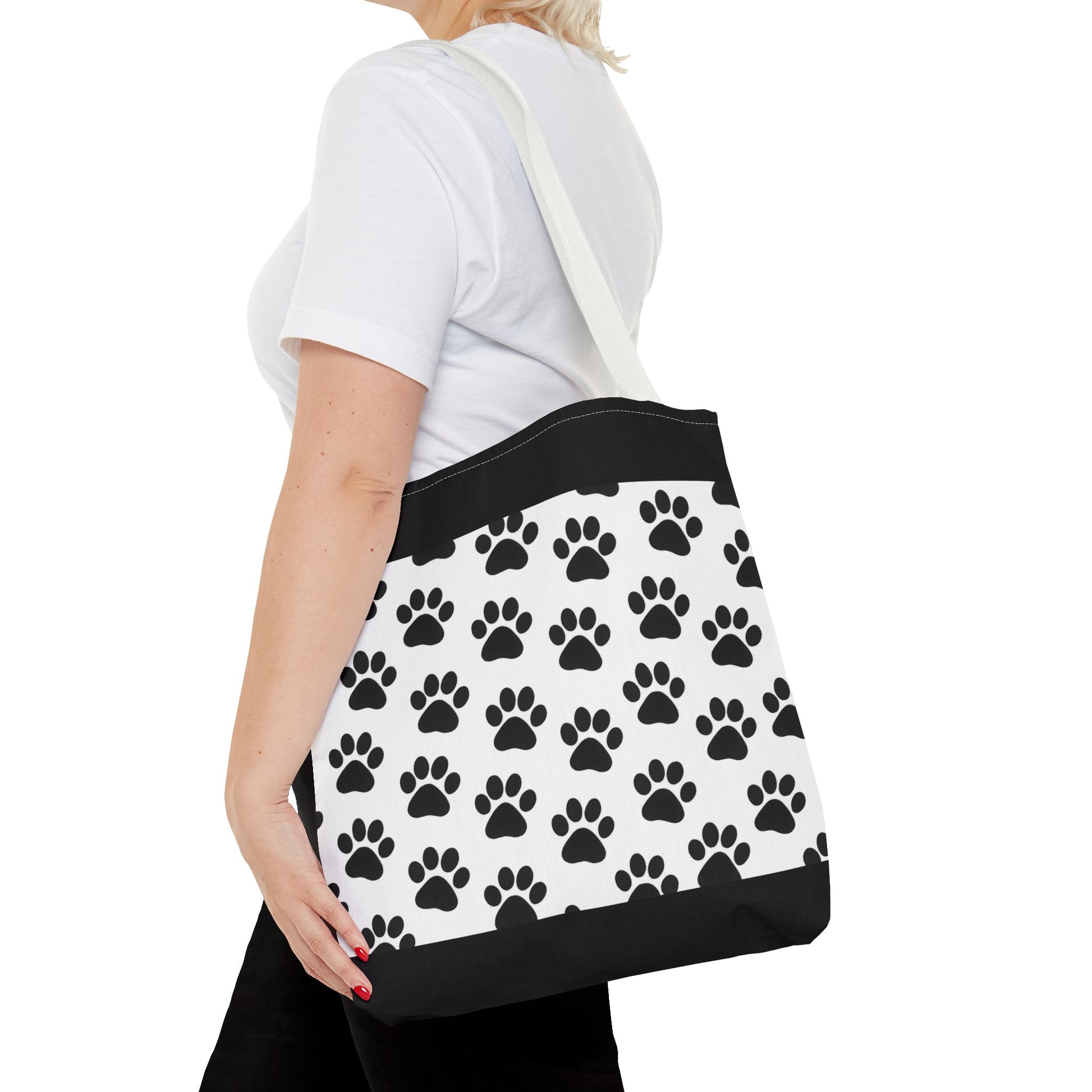 Eco-friendly paw print tote bag by Printify, perfect for dog and cat lovers, with a spacious carryall design.