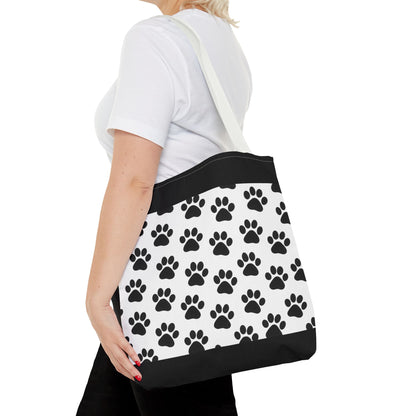 Eco-friendly paw print tote bag by Printify, perfect for dog and cat lovers, with a spacious carryall design.