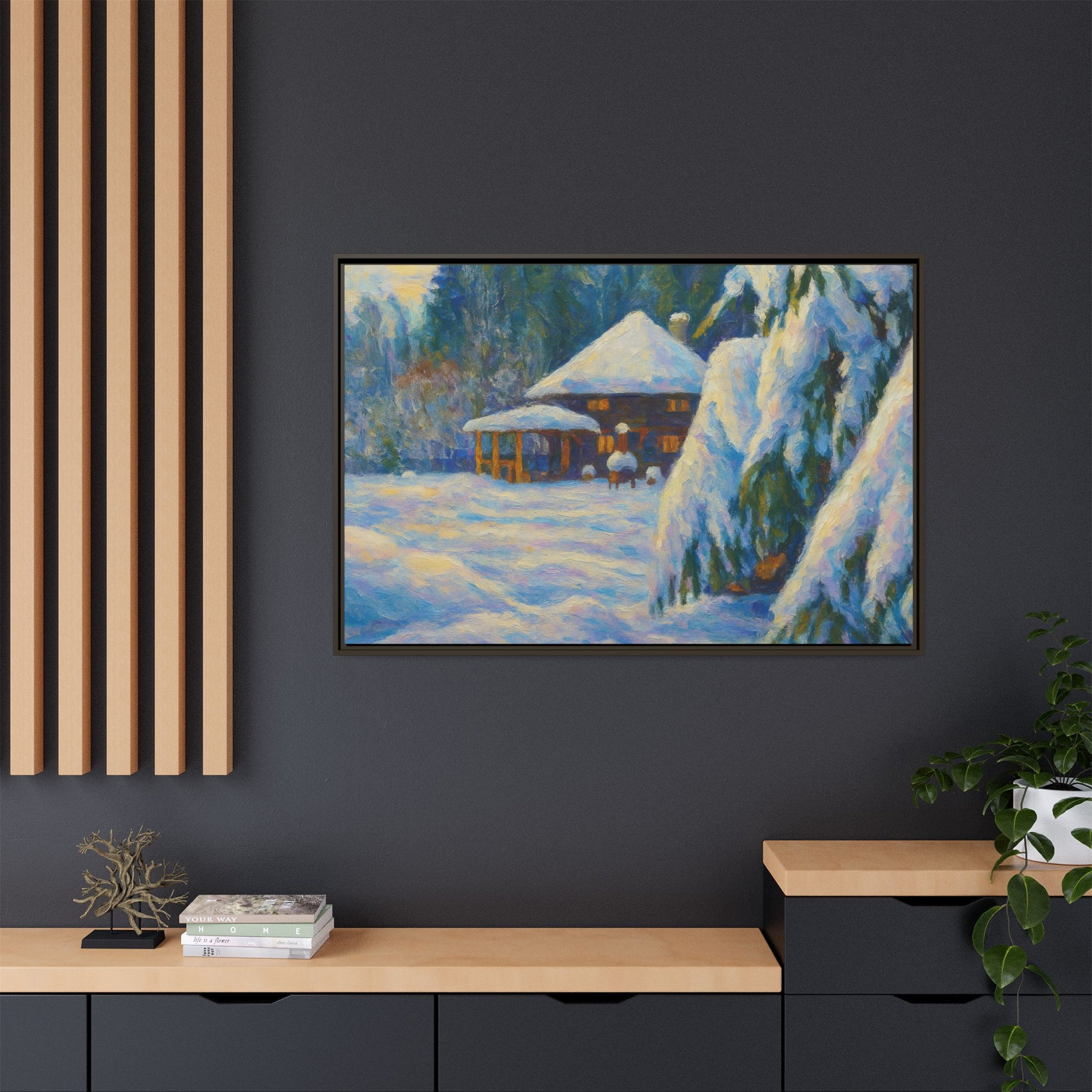 Framed matte canvas wall art of a snowy cabin winter landscape, featuring a cozy snow-covered scene with trees and a rustic cabin.