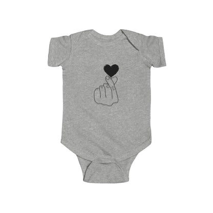 Unisex infant bodysuit with cute heart gesture design, made by Printify, perfect for special occasions and baby photos.