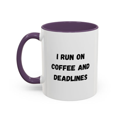 White ceramic coffee mug with "I Run on Coffee and Deadlines" printed in black text, featuring a handle on the side.