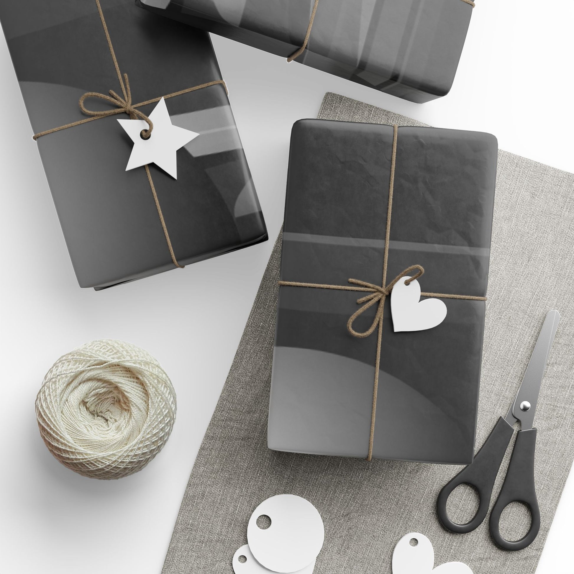 Black and gray geometric shapes wrapping paper roll by Printify, featuring modern, stylish design for gift wrapping.