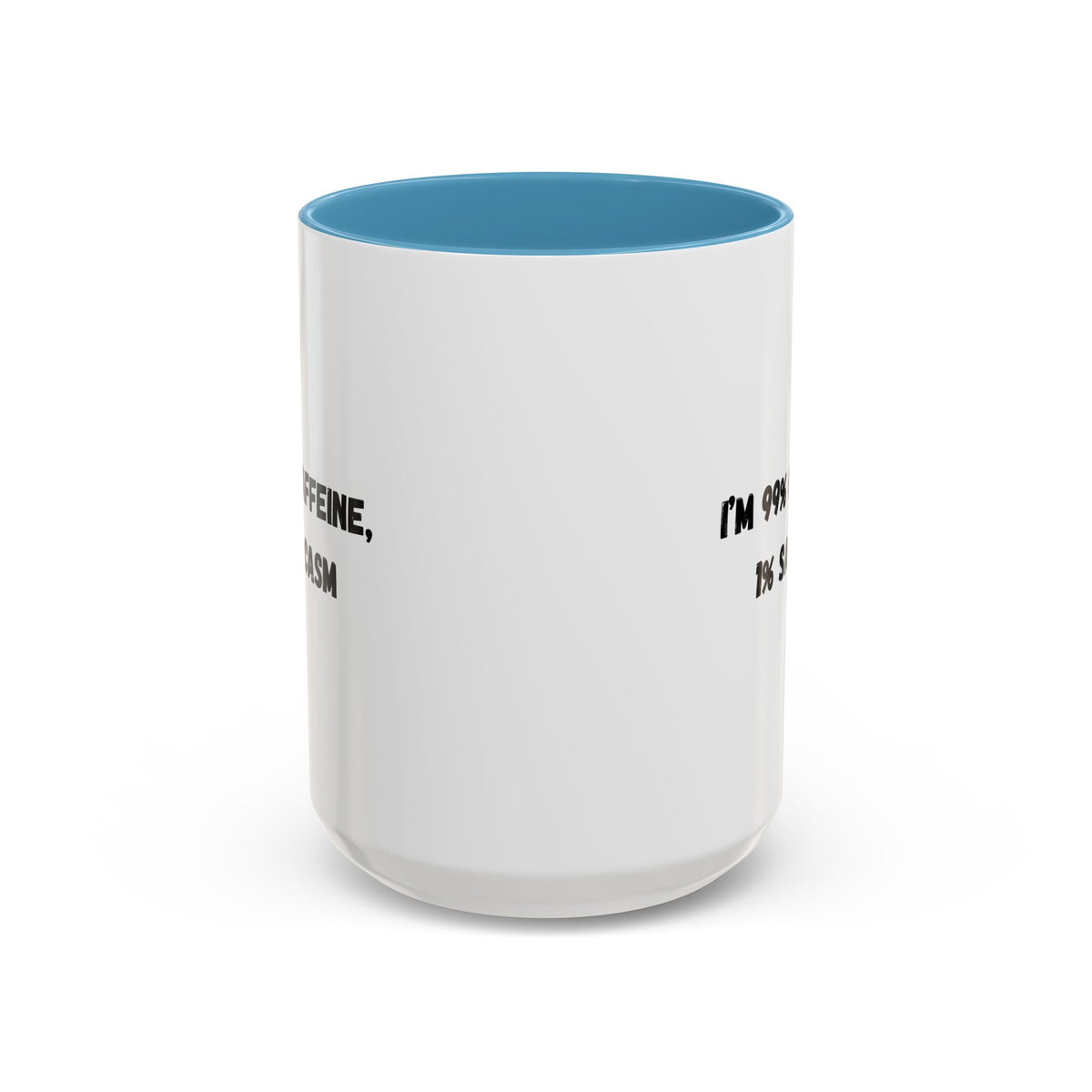 Ceramic coffee mug with "I'm 99% Caffeine, 1% Sarcasm" text, featuring a white background and black lettering.