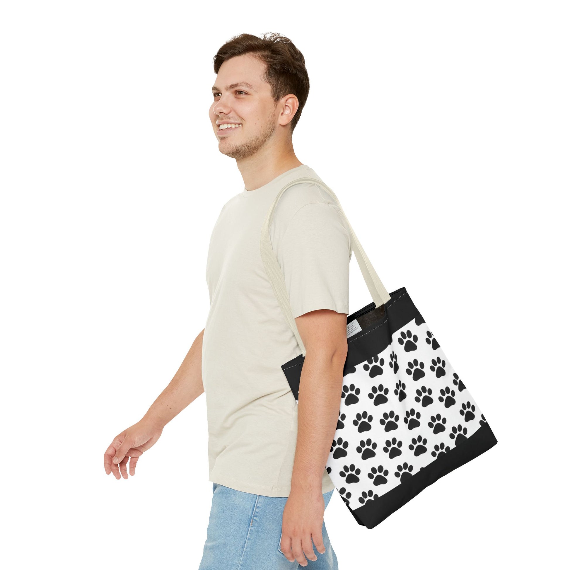 Eco-friendly paw print tote bag by Printify featuring dog and cat paw prints, perfect for pet lovers to carry essentials.