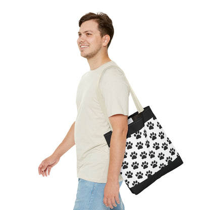 Eco-friendly paw print tote bag by Printify featuring dog and cat paw prints, perfect for pet lovers to carry essentials.