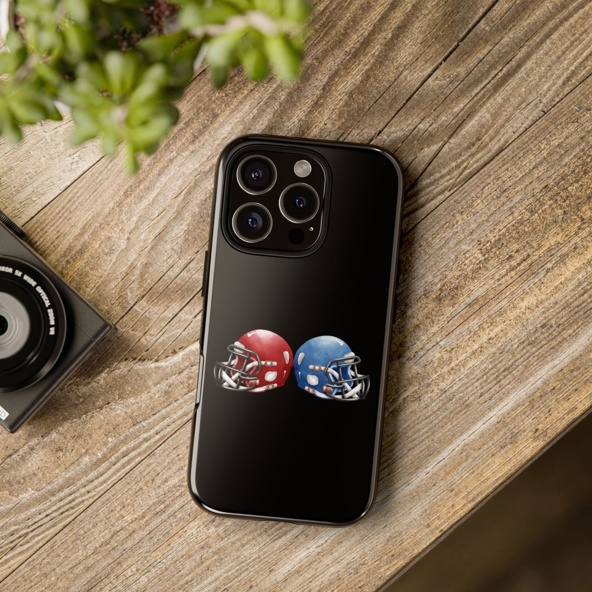 Red and blue football helmet tough phone case for iPhone, protective Printify cover with sporty design.