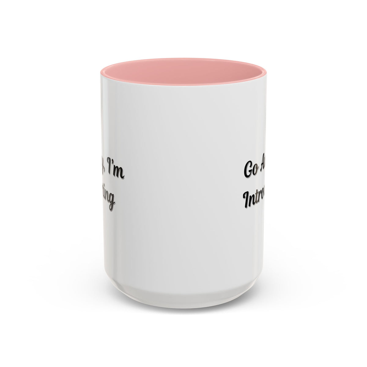 Ceramic coffee mug with "Go Away, I'm Introverting" text, 11 oz size, featuring a white exterior and black handle.