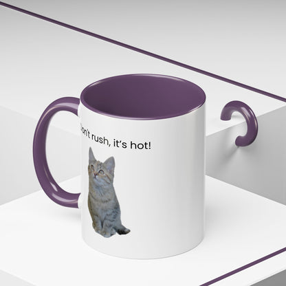Ceramic cat coffee mug with "Don't rush, it's hot!" message, 11 oz, featuring a playful cat design on a white background.
