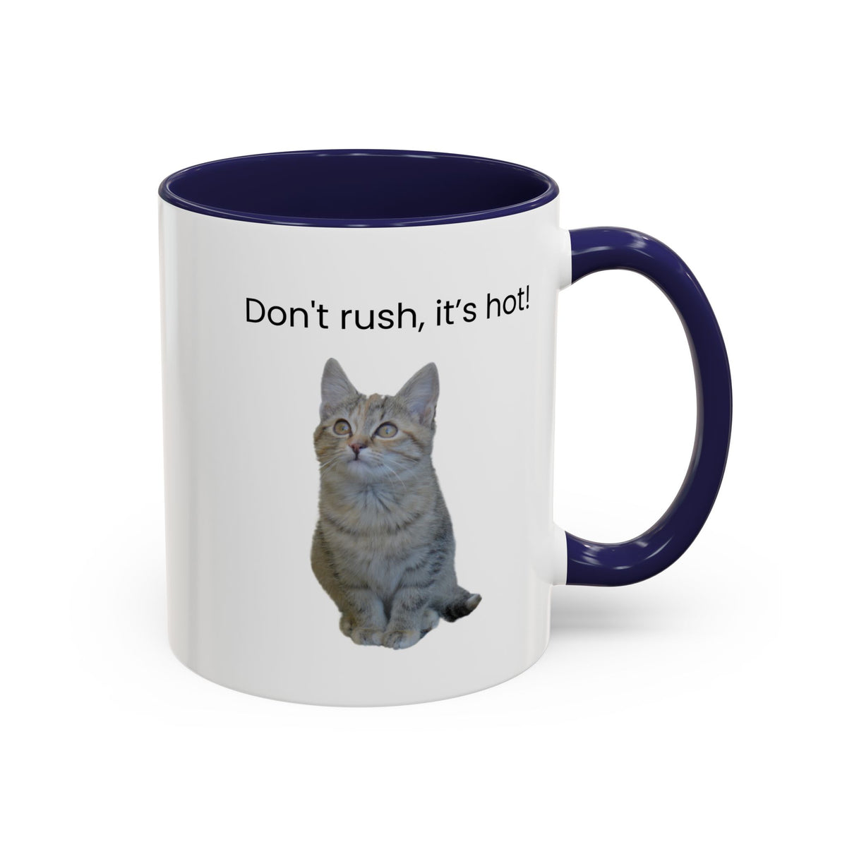 Ceramic cat coffee mug with "Don't rush, it's hot!" slogan in 11 oz size, featuring a playful cat illustration.