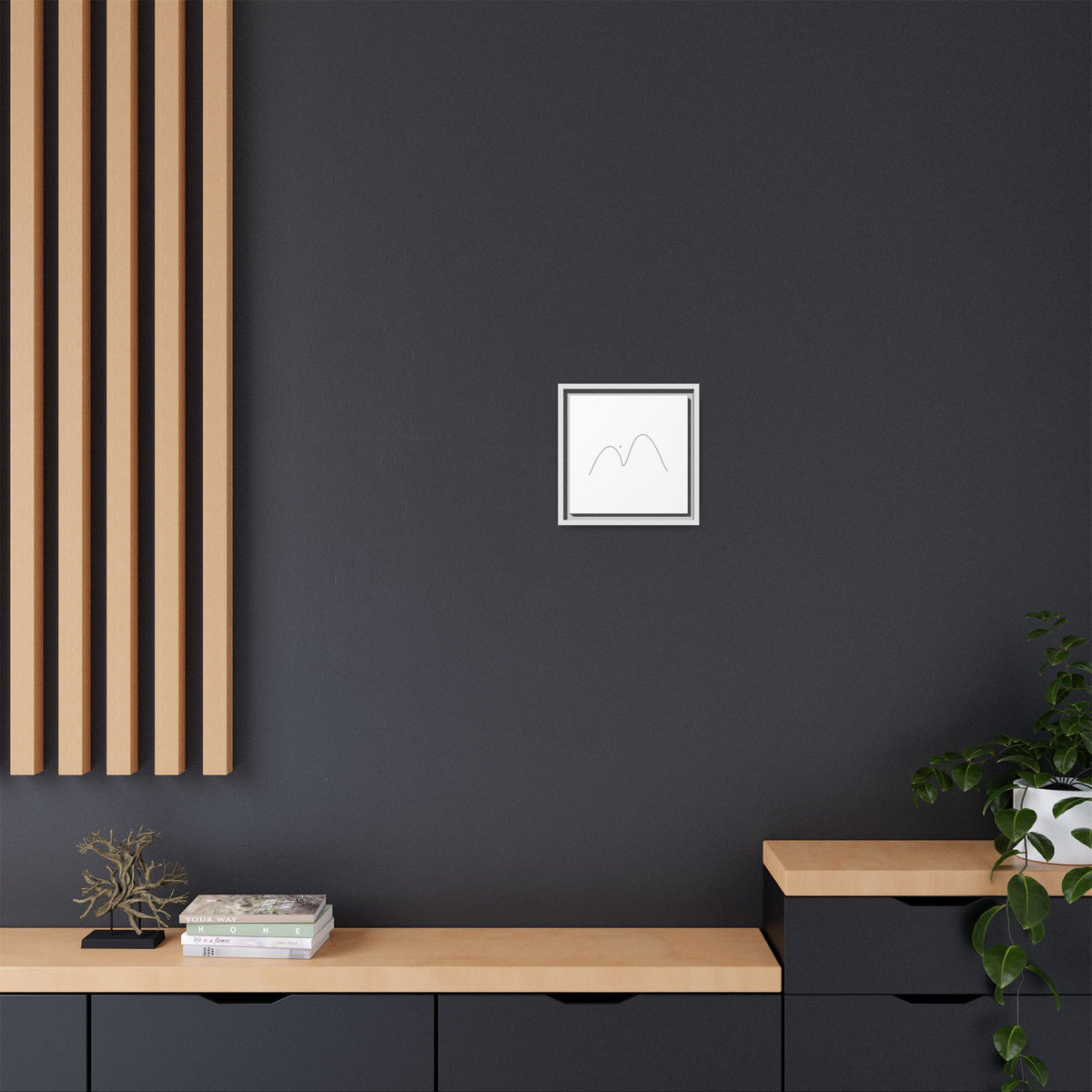 Framed minimalist mountain line art canvas print by Printify, showcasing a simple, modern mountain landscape in black ink on matte canvas.