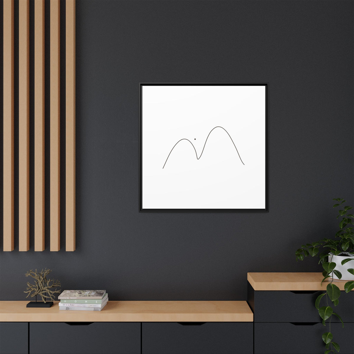 Framed matte canvas featuring minimalist mountain line art by Printify, showcasing simple black mountain outline on white background.