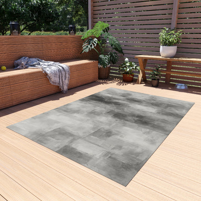 Grey outdoor waterproof blanket by Printify, ideal for patios and decks, featuring a modern design and soft, durable fabric.