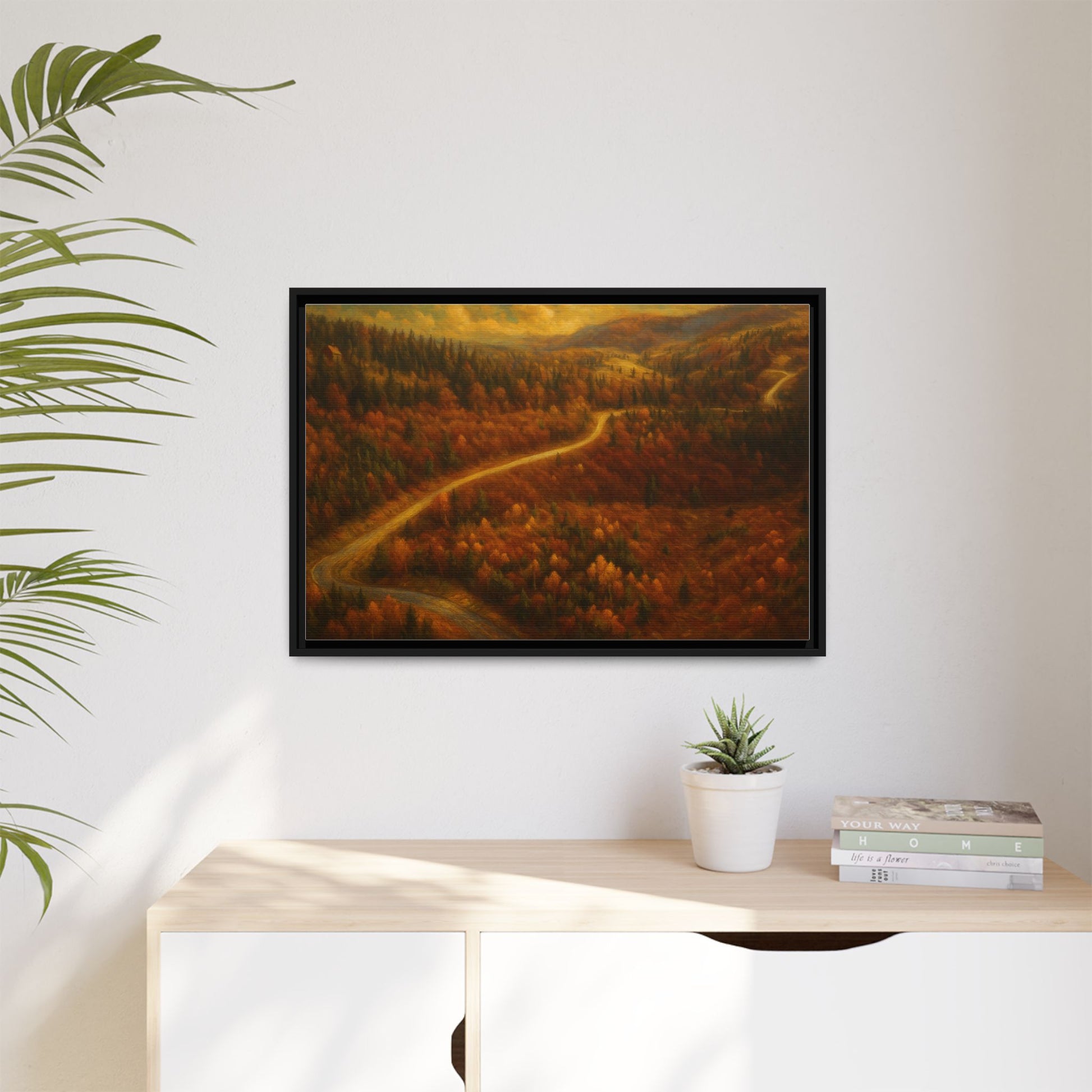 Framed matte canvas print of a scenic autumn forest road landscape wall art by Printify showing vibrant fall foliage and a winding path.