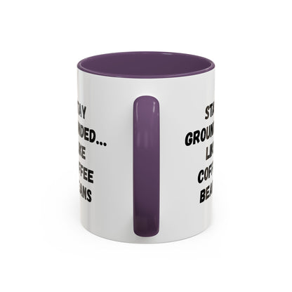 White ceramic mug with "Stay Grounded Like Coffee Beans" printed in black, perfect for coffee lovers, 11oz size.