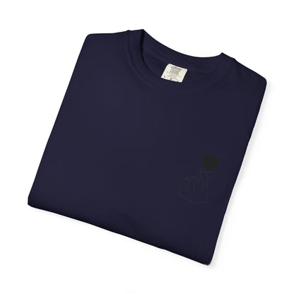 Black T-shirt with a minimal white finger heart graphic, casual Printify brand tee perfect for everyday wear.