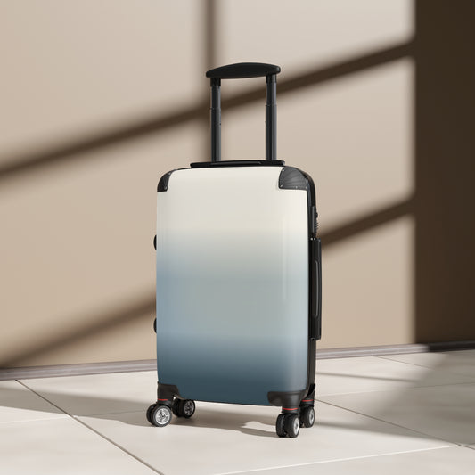 Gradient blue carry-on suitcase by Printify, featuring an ombre design, lightweight travel luggage with a durable exterior.
