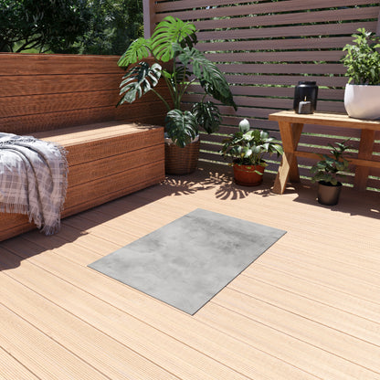 Modern gray outdoor rug by Printify, showcasing durable indoor-outdoor flooring suitable for patios and decks.
