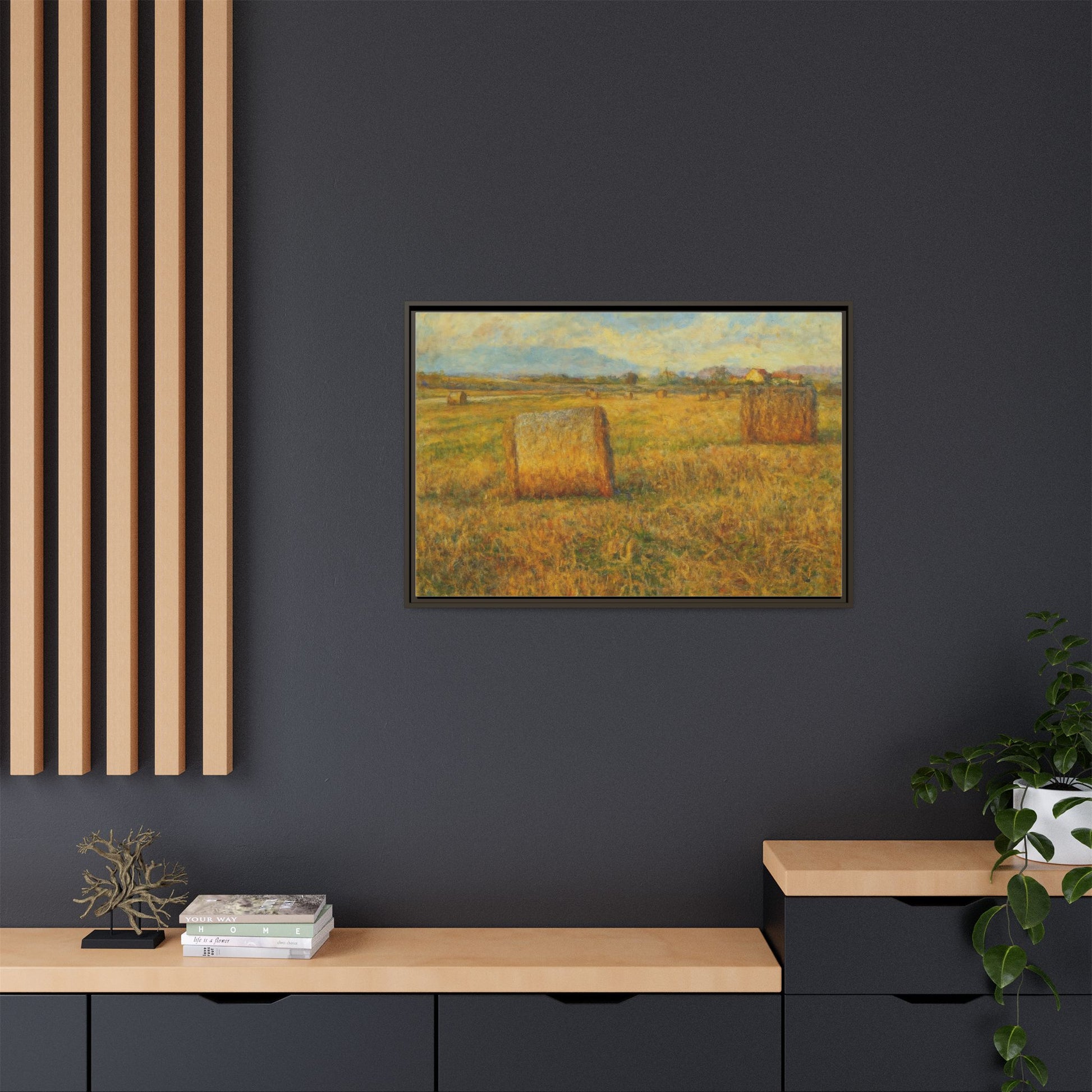 Framed matte canvas wall art featuring a rustic hayfield landscape print by Printify, showcasing a peaceful rural scene.