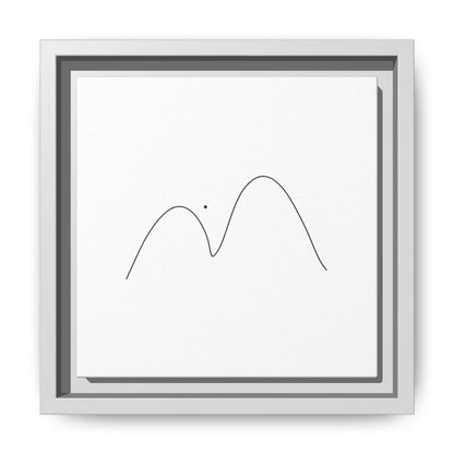 Framed minimalist mountain line art on matte canvas by Printify, showcasing simple black mountain outlines on a white background.