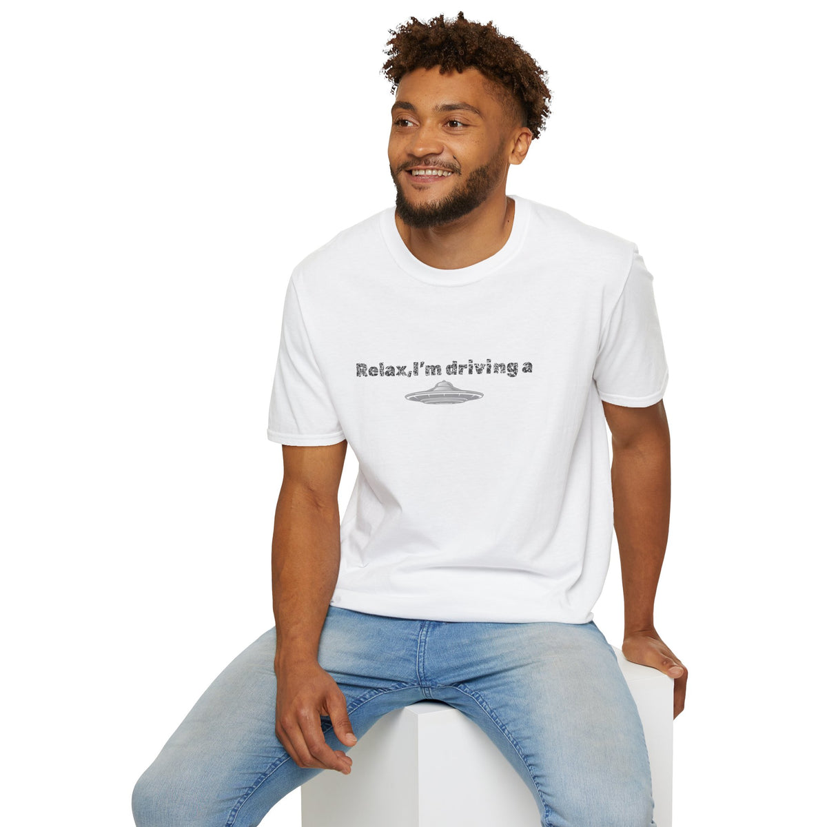 Funny alien graphic T-shirt featuring a UFO design, perfect for sci-fi fans and alien enthusiasts.