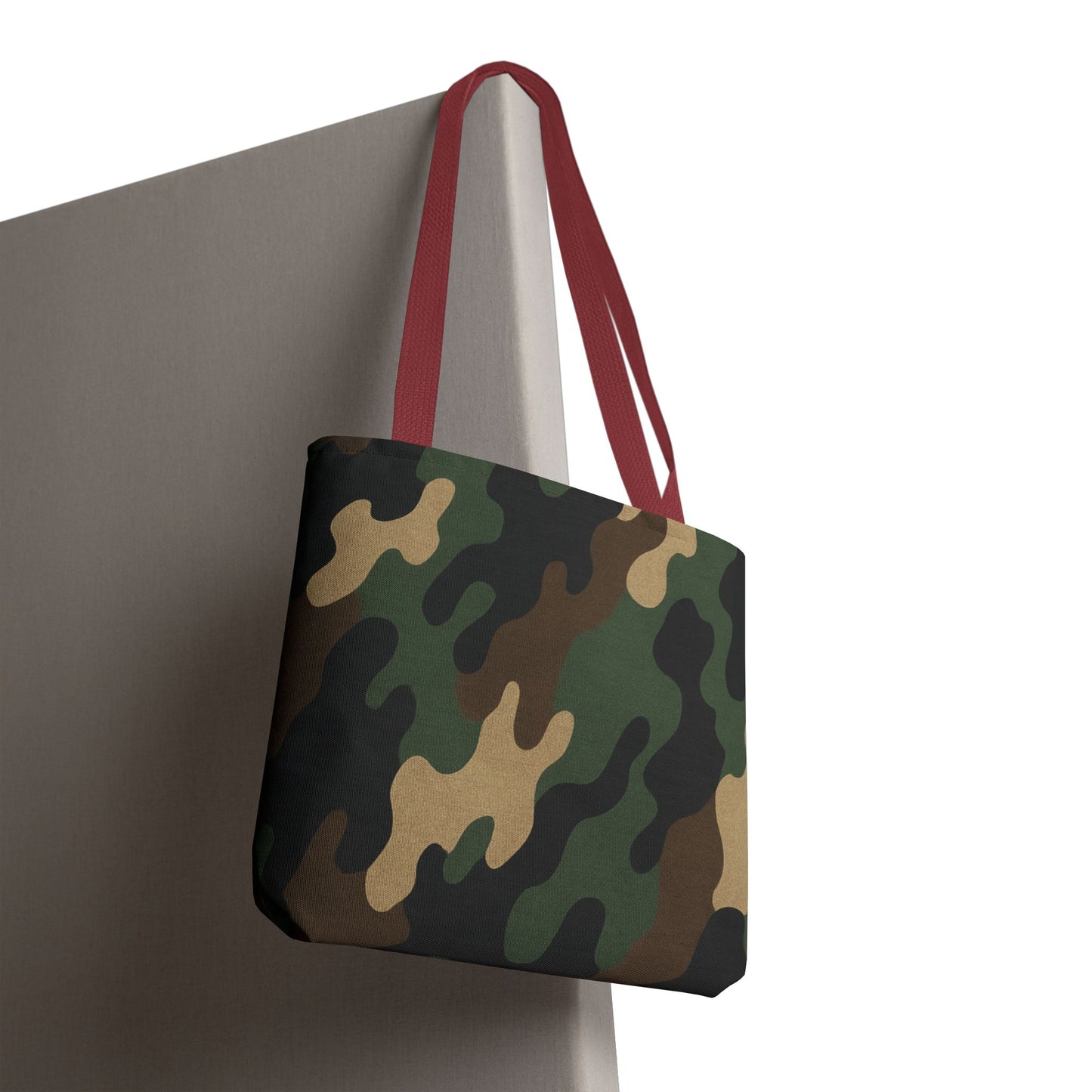 Camo pattern tote bag by Printify featuring all-over printed canvas, spacious carryall with sturdy handles and camo design.
