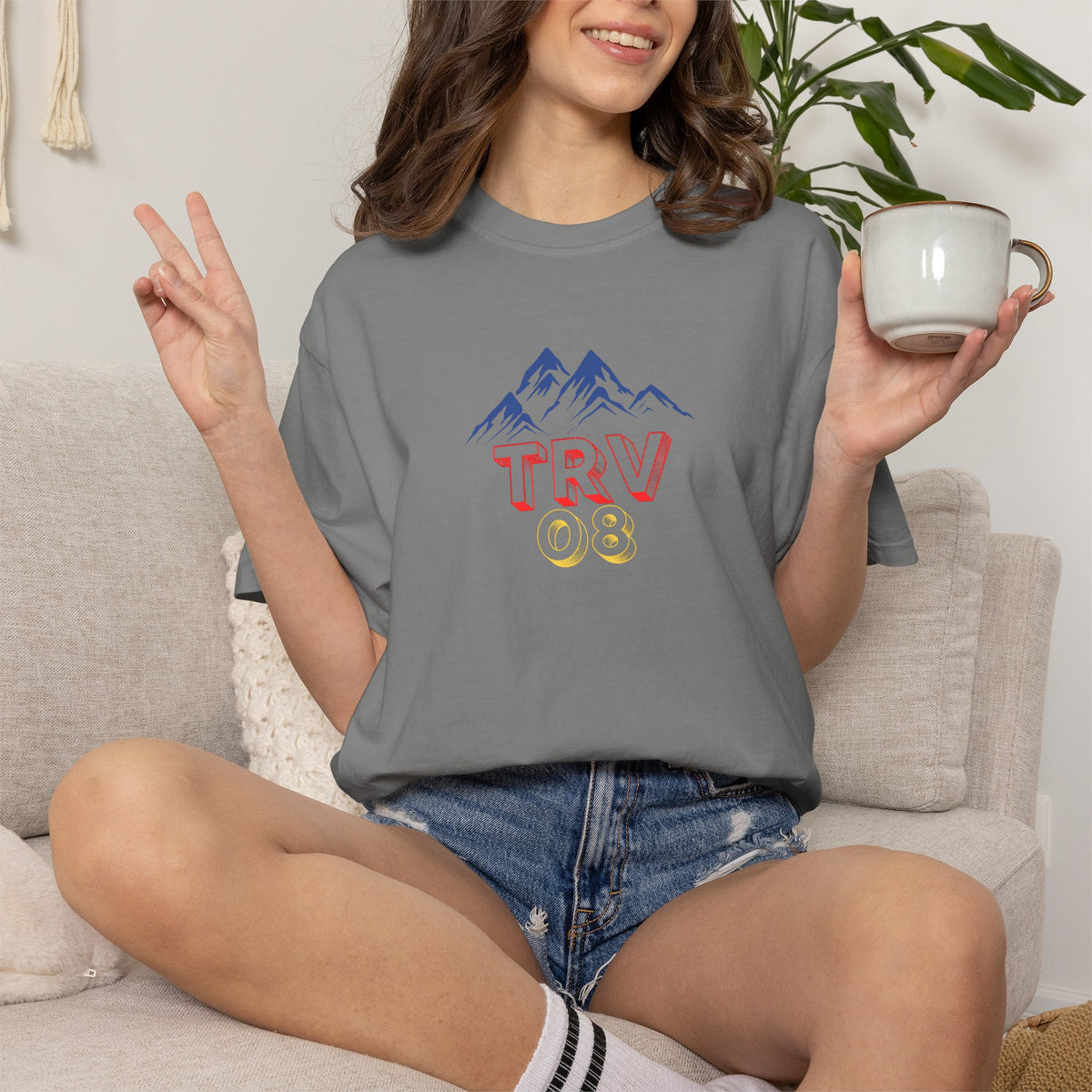Unisex garment-dyed T-shirt with TRV08 Logo print, made by Printify, shown on a neutral background.