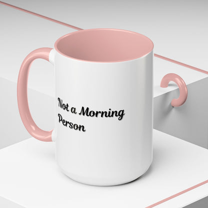 Ceramic coffee mug with "Not a Morning Person" phrase in black text, 11oz capacity, by Printify, on a white background.
