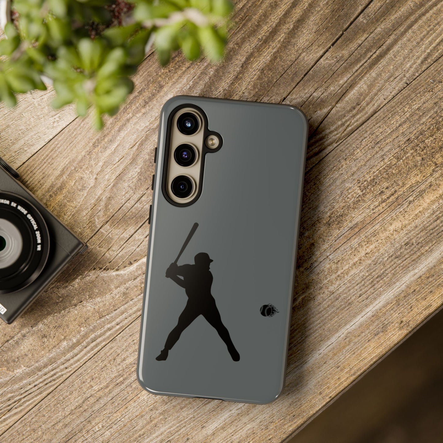 Black baseball silhouette tough phone case for iPhone, protective sporty design by Printify.
