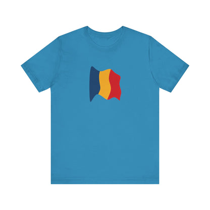 Romania flag T-shirt by Printify, minimal waving tricolor design on a casual T-shirt, featuring red, yellow, and blue stripes.